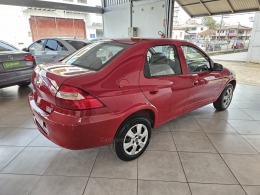 CHEVROLET - PRISMA - 2010/2011 - Vermelha - R$ 27.500,00