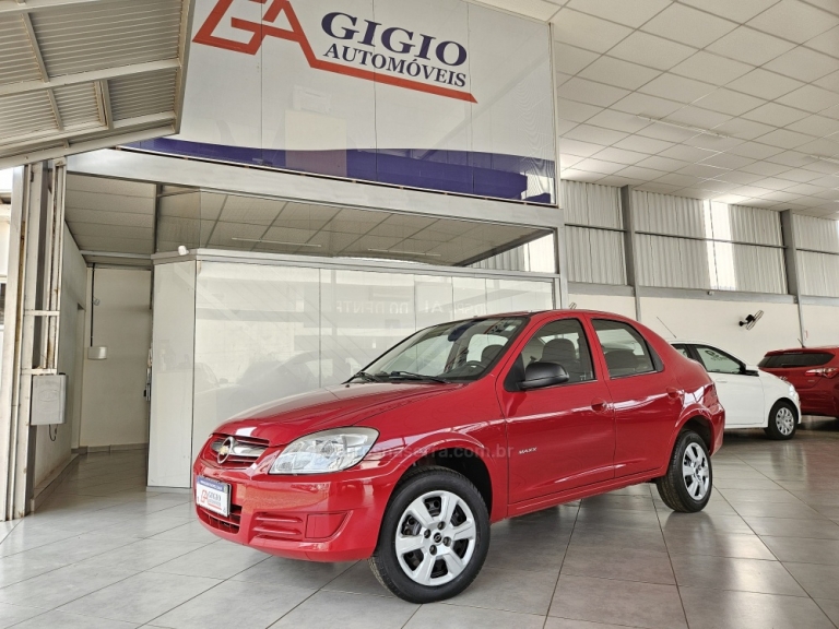 CHEVROLET - PRISMA - 2010/2011 - Vermelha - R$ 27.500,00